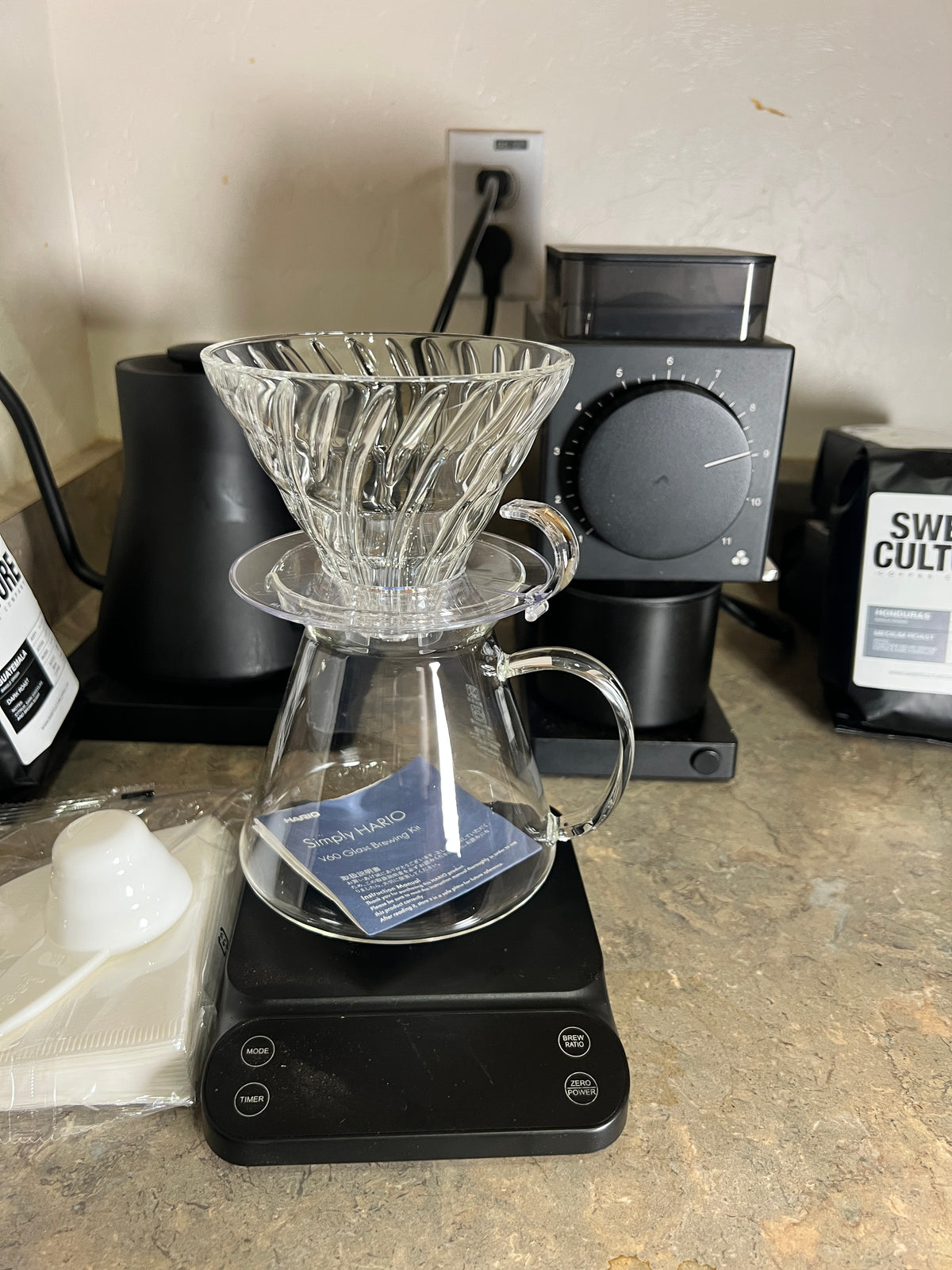 Pouring water into the Hario V60 glass dripper